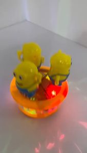 Toy - Electric Spinning Toy Mi Nions 🌟Colorful Light 🌟Music 🌟360° Gyrate Gift for Children Ages 3+ (DLK52769)