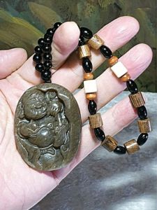 Premium caramel brownish Nephrite Laughing Buddha Jade handheld (with certificate) 和田玉且末糖笑口常开弥勒佛手把(带证书)