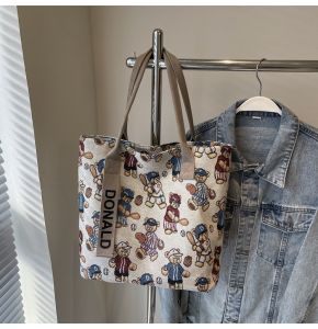 Spring 2025 Large Capacity Canvas Tote Bag Womens Commuter Single Shoulder Handbag Casual Shopping Bag Soft Fabric Zipper Closure