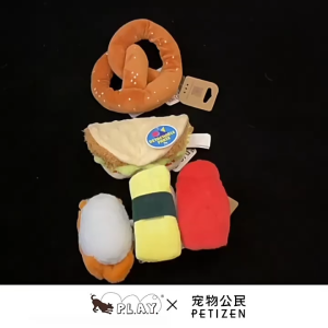 P.L.A.Y. International Classic Dog Plush Toy | Squeaky Food-Themed Toy for Dogs