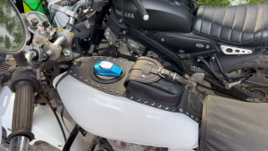 Áo da bao bình xăng Suzuki Sym Husky 125