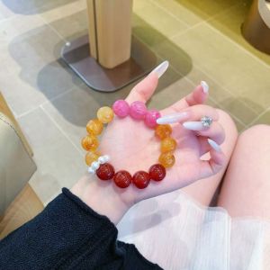 สร้อยข้อมือคริสตัลธรรมชาติที่ทันสมัยผู้หญิงใหม่คริสตัลธรรมชาติขนาดใหญ่อนุภาคสีเหลืองกาวดอกไม้สร้อยข้อมือการออกแบบดั้งเดิมขนาดใหญ่ลูกปัดกาวสีเหลืองดอกไม้คริสตัลสร้อยข้อมือ