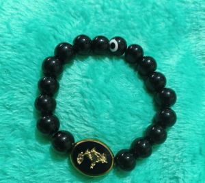 Onyx woth money tree evil eye bracelet