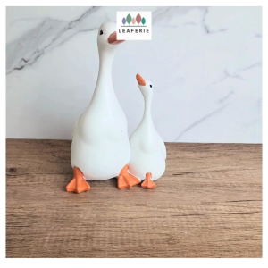 The Leaferie Pippa Duck garden ornament set . ornaments.  decoration . decorations.  gardening tools