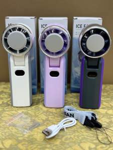 ICE FAN portable handheld fan with USB charging cord and lanyard in white purple and black colors.