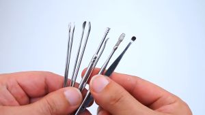 Alat Pembersih Telinga Stainless Korek Kuping Ear Wax Picker 7 PCS