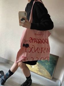 สีชมพูดอกไม้พิมพ์ผ้าใบกระเป๋ากระเป๋าสะพายไหล่ความจุขนาดใหญ่สําหรับผู้หญิงกระเป๋าถืออเนกประสงค์เหมาะสําหรับโรงเรียน