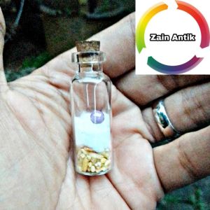 Batu mustika embun aura ungu