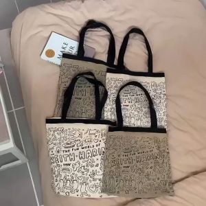 กระเป๋าผ้า Keith Haring สะพายได้ 2 แบบ - 2 สายสัตว์ 2 รูปร่าง เป้าหมายแบบกระเป๋าผ้า