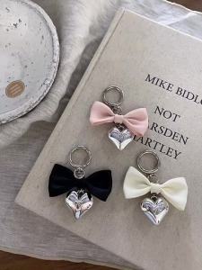 South Koreas new black and white bow silver love bag pendant sweet fashion keychain pendant hanging jewelry