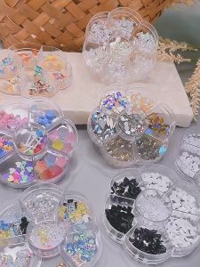 Kotak Stiker Kuku Lucu 3D Efek Resin Kuku Aurora Berlian Imitasi Alat DIY Perlengkapan\\n\\n Apa Itu Kotak Stiker Kuku Lucu 3D?\\n\\nKotak stiker kuku lucu 3D adalah dekorasi kuku yang dirancang dengan penampilan bersinar dan efek resin kuku aurora berlian imitasi yang menakjubkan. Dengan berbagai bentuk dan desain, kotak stiker ini dapat digunakan dengan cat kuku, gel UV atau akrilik, membuat kuku Anda lebih indah dan menarik. Didesain untuk teknisi kuku profesional dan pemula yang tidak berpengalaman, kotak stiker ini memungkinkan Anda untuk merancang gaya dan pola yang Anda inginkan.\\n\\n Penampilan Bersinar & Material\\n\\nKotak stiker kuku lucu 3D memiliki penampilan bersinar yang mencolok dan efek resin kuku aurora berlian imitasi yang unik. Material yang digunakan dalam pembuatan stiker ini sangat berkualitas, sehingga dapat memberikan hasil akhir yang indah dan tahan lama.\\n\\n Variasi Bentuk & Desain\\n\\nDekorasi kuku ini memiliki berbagai bentuk dan desain, seperti ikatan simpul, beruang, mutiara imitasi, dan lainnya. Anda dapat memilih desain yang sesuai dengan selera Anda dan mengaplikasikannya pada kuku Anda untuk menciptakan gaya unik.\\n\\n Cara Menggunakan Kotak Stiker Kuku Lucu 3D\\n\\nBerikut adalah langkah-langkah dasar untuk menggunakan kotak stiker kuku lucu 3D:\\n\\n1. Bersihkan kuku Anda dengan baik sebelum aplikasi stiker.\\n2. Gunakan cat kuku, gel UV atau akrilik sesuai kebutuhan.\\n3. Tempelkan stiker kuku pada kuku Anda dengan hati-hati.\\n4. Biarkan stiker mengering selama beberapa menit.\\n5. Gunakan finishing top coat untuk melindungi stiker kuku Anda.\\n\\n Tips & Trik Penggunaan\\n\\n* Pastikan kuku Anda bersih dan kering sebelum aplikasi stiker.\\n* Gunakan alat pelindung kuku jika diperlukan untuk mencegah kerusakan pada kuku Anda.\\n* Jika stiker kuku tampak longgar, gunakan lem kuku tambahan untuk memperkuat pengikatan.\\n\\n Manfaat Kotak Stiker Kuku Lucu 3D\\n\\nKotak stiker kuku lucu 3D memiliki banyak manfaat bagi profesional dan pemula dalam bidang seni kuku.\\n\\n Untuk Profesional & Pemula\\n\\nKotak stiker kuku lucu 3D dapat digunakan oleh profesional dan pemula dalam bidang seni kuku untuk menciptakan gaya dan pola yang menarik. Dengan berbagai bentuk dan desain, Anda dapat merancang kuku yang unik dan menarik.\\n\\n Aplikasi Lainnya Selain Kuku\\n\\nSelain digunakan pada kuku, dekorasi kuku ini juga dapat digunakan untuk menghias rumah Anda, casing ponsel, kacamata, kartu buatan, seni tubuh, dan lainnya. Dengan demikian, kotak stiker kuku lucu 3D memiliki banyak manfaat dan aplikasi yang beragam.\\n\\n Kesimpulan\\n\\nKotak stiker kuku lucu 3D adalah alat DIY perlengkapan yang sangat berguna untuk menciptakan gaya dan pola yang menarik pada kuku Anda. Dengan berbagai bentuk dan desain, serta efek resin kuku aurora berlian imitasi yang menakjubkan, kotak stiker ini dapat digunakan oleh profesional dan pemula dalam bidang seni kuku. Selain itu, dekorasi kuku ini juga dapat digunakan untuk menghias berbagai item lainnya, menjadikannya alat yang multifungsi dan berguna.\n}