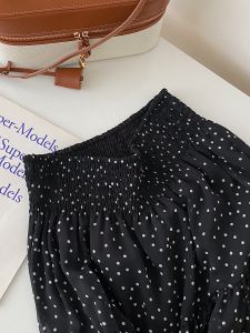 กระโปรงทรงเอเอวสูงสีดำสไตล์วินเทจ กระโปรงทรงเอพิมพ์ลายจุดสำหรับผู้หญิง ฤดูร้อน 2025 กระโปรงทรงเอเอวสูงทรงหลวม