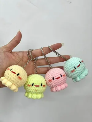Móc khoá len bạch tuộc màu pastel với khuôn mặt đáng yêu.