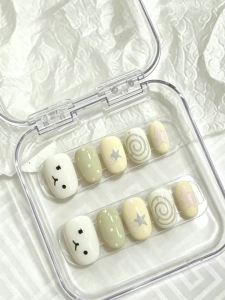 10 Pieces of Short Square-Shaped Handmade Full-Cover Nail Tips Featuring Cute Yellow-Green Expressions Soft and Adorable Cartoon Style with Designs of Expressions Stars and Swirls Using a Fresh Color-Blocking Technique Suitable for Summer Vacat...