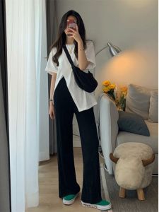 เสื้อยืดแขนสั้นผู้หญิงทรงหลวมบางฤดูร้อน 2025 ดีไซน์ใหม่ ทรงหลวมไม่สมมาตร เสื้อตัวบนกระชับสัดส่วน ผ้าฝ้าย คอกลม