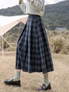 กระโปรงทรงเอเอวสูง กระโปรงสั้นลายสก็อตสไตล์นักศึกษา กระโปรงยาวคลุมเข่าสำหรับผู้หญิง ฤดูใบไม้ผลิ 2025 สไตล์ใหม่