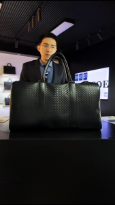 Padieoe Top layer cowhide embossed woven travel bag fashionable genuine leather business luggage bag mens and womens lightweight travel bag business trip bag