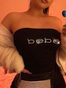 เสื้อกั๊กยกทรงสั้นแขนกุดเข้ารูปพอดีตัวสําหรับผู้หญิงวัสดุโพลีเอสเตอร์สายรัดปรับระดับการออกแบบเปลือยสําหรับงานเลี้ยงวันเกิด 18-25