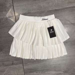 Chân váy xếp ly nhỏ 2 tầng Titleist thể thao sport chơi golf tennis cầu lông khiêu vũ vải thun 4 chiều siêu xịn