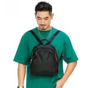 กระเป๋าเป้สะพายหลังผู้ชายแบบลำลองน้ำหนักเบา กันน้ำ ขนาดเล็ก กระเป๋าเดินทางสำหรับเล่นกีฬา กระเป๋าสะพายไหล่แบบลำลอง สไตล์สตรีท กระเป๋าใส่โน้ตบุ๊ก 12 นิ้ว