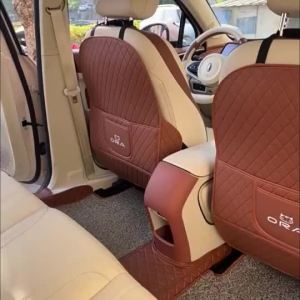 Gwm ORA GOOD CAT EV ทุ่มเทด้านหลัง Central Anti-Kick เปลือกตกแต่งเบาะภายในรถด้านหลังการปรับเปลี่ยนอัพเกรด