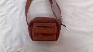 CJHBAGS#4068 Corduroy crossbody/shoulder bag for women with front flap pocket main zipper closure and an adjustable strap.