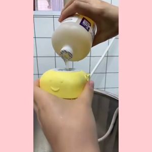 Dog Bath Massage Brush Comb: A Multi-functional Shampoo Dispenser