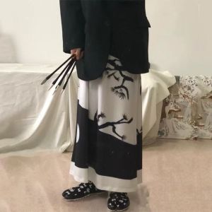 กระโปรงทรงเอพิมพ์ลายหมึกสีน้ำสำหรับผู้หญิง ทรงหลวม กระโปรงยาวปานกลาง เทรนด์แฟชั่นฤดูใบไม้ผลิ 2025 กระโปรงทรงเอเอวสูง