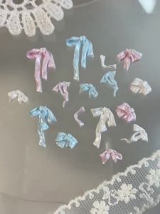 72Pcs 3D Pearlescent Ribbon Nail Charms Mixed White Pink Blue Satin Bowknot Nail Art Decorations Multiple Craving Bow Rhinestone