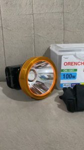 Orenchi Senter Kepala JUMBO OK-1001 100 Watt Baterai 7000MAH CAHAYA PUTIH Tahan 20 JAM