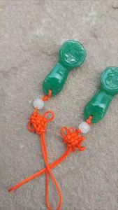 ที่ห้อยด้ายแดง คฑาอยู่อี่ เสริมโชค ความสำเร็จ หน้าที่การงาน