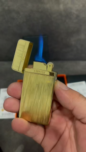 Slim and lightweight lighter with dual flame switch uniquely compact design crafted exclusively for men