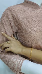 Tunik Brokat: Kebaya Modern & Batik Couple\\n\\n Apa itu Tunik Brokat?\\n\\nTunik brokat adalah sebuah pakaian tradisional Indonesia yang memiliki desain dan karakteristik unik. Bahan brokat yang digunakan untuk membuat tunik ini biasanya berwarna cerah dan memiliki motif yang indah. Sebagai bagian dari budaya Indonesia, tunik brokat telah menjadi simbol keindahan dan keanggunan bagi wanita Indonesia.\\n\\n Sejarah Tunik Brokat\\n\\nTunik brokat memiliki sejarah yang panjang dan kaya di Indonesia. Pakaian ini telah digunakan sejak zaman kerajaan-kerajaan di Nusantara. Selama berabad-abad, tunik brokat telah berkembang menjadi pakaian yang lebih modern dan elegan, tetapi tetap mempertahankan keunikan dan keindahan budaya Indonesia.\\n\\n Karakteristik Tunik Brokat\\n\\nBeberapa karakteristik tunik brokat yang perlu diketahui adalah:\\n\\n- Bahan brokat yang halus dan berwarna cerah\\n- Motif yang indah dan unik\\n- Desain yang modern dan elegan\\n- Bisa dipadukan dengan celana atau rok\\n\\n Bagaimana Memilih Tunik Brokat yang Tepat?\\n\\nUntuk memilih tunik brokat yang tepat, berikut beberapa tips yang bisa diterapkan:\\n\\n- Perhatikan bahan brokat yang digunakan\\n- Pilih motif yang sesuai dengan selera\\n- Perhatikan ukuran dan desain tunik\\n\\n Kebaya Modern Batik\\n\\nKebaya modern batik adalah pakaian yang dikombinasikan antara bahan batik dan tunik brokat. Pakaian ini cocok dikenakan pada acara-acara formal seperti pernikahan, resepsi, atau acara lainnya.\\n\\n Kebaya Favorite Batik\\n\\nKebaya favorite batik adalah pakaian yang dikombinasikan antara bahan batik dan tunik brokat dengan desain yang unik dan menarik. Pakaian ini cocok dikenakan pada acara-acara semi-formal seperti pesta, acara keluarga, atau acara lainnya.\\n\\n Kebaya Couple Sanghai\\n\\nKebaya couple shanghai adalah pakaian yang dikombinasikan antara bahan batik dan tunik brokat dengan desain yang serasi untuk pasangan. Pakaian ini cocok dikenakan pada acara-acara formal seperti pernikahan, resepsi, atau acara lainnya.\\n\\n Mengenakan Tunik Brokat dengan Elegan\\n\\nUntuk mengenakan tunik brokat dengan elegan, berikut beberapa tips yang bisa diterapkan:\\n\\n- Kombinasikan dengan celana yang sesuai\\n- Kombinasikan dengan rok yang sesuai\\n- Kombinasikan dengan outerwear yang sesuai\\n\\n Kombinasi dengan Celana\\n\\nUntuk kombinasi dengan celana, pilih celana yang sesuai dengan bahan brokat dan motif tunik brokat. Pastikan celana yang dipilih memiliki warna yang senada atau kontras dengan tunik brokat.\\n\\n Kombinasi dengan Rok\\n\\nUntuk kombinasi dengan rok, pilih rok yang sesuai dengan bahan brokat dan motif tunik brokat. Pastikan rok yang dipilih memiliki warna yang senada atau kontras dengan tunik brokat.\\n\\n Kombinasi dengan Outerwear\\n\\nUntuk kombinasi dengan outerwear, pilih outerwear yang sesuai dengan bahan brokat dan motif tunik brokat. Pastikan outerwear yang dipilih memiliki warna yang senada atau kontras dengan tunik brokat.\\n\\n Tips Merawat Tunik Brokat\\n\\nUntuk merawat tunik brokat dengan baik, berikut beberapa tips yang bisa diterapkan:\\n\\n- Simpan tunik brokat di tempat yang aman dan kering\\n- Bersihkan tunik brokat secara rutin\\n- Hindari kerusakan pada tunik brokat\\n\\n Cara Menyimpan Tunik Brokat\\n\\nUntuk menyimpan tunik brokat dengan baik, simpan di tempat yang aman dan kering. Jangan simpan tunik brokat di tempat yang lembab atau terkena sinar matahari langsung.\\n\\n Cara Membersihkan Tunik Brokat\\n\\nUntuk membersihkan tunik brokat, gunakan deterjen yang sesuai dan cuci secara rutin. Jangan gunakan mesin cuci atau pengering pakaian.\\n\\n Cara Menghindari Kerusakan pada Tunik Brokat\\n\\nUntuk menghindari kerusakan pada tunik brokat, hindari menggosok atau meremas tunik brokat. Jangan gunakan benda-benda tajam seperti jarum atau pin.\\n\\n Kebaya Tile Batik: Alternatif Tunik Brokat\\n\\nKebaya tile batik adalah alternatif tunik brokat yang bisa dikenakan pada acara-acara formal atau semi-formal. Pakaian ini memiliki karakteristik dan keunggulan yang berbeda dari tunik brokat.\\n\\n Karakteristik Kebaya Tile Batik\\n\\nBeberapa karakteristik kebaya tile batik yang perlu diketahui adalah:\\n\\n- Bahan batik yang halus dan berwarna cerah\\n- Motif yang indah dan unik\\n- Desain yang modern dan elegan\\n- Bisa dipadukan dengan celana atau rok\\n\\n Keunggulan Kebaya Tile Batik\\n\\nBeberapa keunggulan kebaya tile batik yang perlu diketahui adalah:\\n\\n- Bisa dipadukan dengan celana atau rok\\n- Cocok dikenakan pada acara-acara formal atau semi-formal\\n- Lebih mudah dirawat dibandingkan dengan tunik brokat\\n\\n Kelemahan Kebaya Tile Batik\\n\\nBeberapa kelemahan kebaya tile batik yang perlu diketahui adalah:\\n\\n- Harga yang lebih mahal dibandingkan dengan tunik brokat\\n- Tidak semua orang menyukai motif batik\\n- Kurang cocok dikenakan pada acara-acara kasual\n}