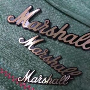 โลโก้ลำโพงบลูทูธMarshall หนา2มิล(เหมือนแท้) สีทองตัดดำเงางาม สินค้าพร้อมส่ง ดูดี สติ๊กเกอร์ 3D การตกแต่ง(เหมือนแท้)