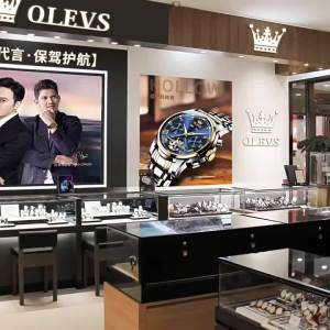 OLEVS 9809นาฬิกาควอตซ์สีเขียว Submariner นาฬิกาสำหรับผู้ชายสายเหล็กส่องสว่าง