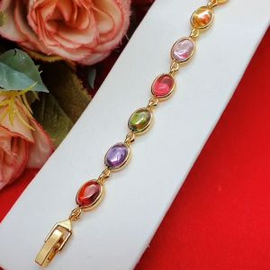 สร้อยข้อมือทองฝังพลอยนพเก้า ความยาว 7 นิ้ว ตะขอคลิปล็อค ใช้ได้ทุกโอกาส ใส่อาบน้ำได้  ทำจากทองเหลือง เคลือบทองคุณภาพสูง