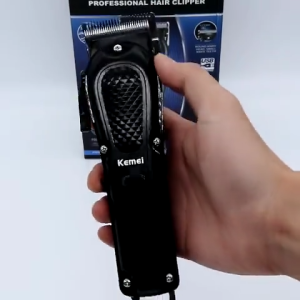 Kemei KM-1071 Hot Selling Automatic Grinding Oil Head Engraving Cordless USB Rechargeable Professional Hair Clipper