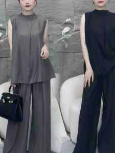 Fashion Suit Female 2024 Spring and Summer New Arrival Loose Elegance Sleeveless Tops High Waist Wide-Leg Casual Pants Two-piece Set\\n\\n Introduction to the 2024 Spring & Summer Fashion Suit\\n\\nAs we eagerly anticipate the arrival of spring and summer, fashion enthusiasts are already looking forward to embracing new trends and styles. This year, the Loose Elegance Sleeveless Tops paired with High Waist Wide-Leg Casual Pants is making waves as a must-have two-piece set. This versatile outfit offers both comfort and style, making it perfect for any occasion.\\n\\n Overview of the Loose Elegance Sleeveless Tops\\n\\nThe Loose Elegance Sleeveless Tops feature a relaxed fit that flatters various body types. With its elegant design, this top can be dressed up or down depending on the occasion. The loose fit allows for easy movement and breathability, making it ideal for warmer weather.\\n\\n Overview of the High Waist Wide-Leg Casual Pants\\n\\nHigh waist wide-leg casual pants are a popular choice among women who prioritize comfort and style. These pants offer a flattering silhouette, accentuating the natural waistline while providing ample room for movement. The high waist provides support and a comfortable fit, making them suitable for all-day wear.\\n\\n How to Style Your New Arrival Loose Fit Tops\\n\\nNow that you've invested in this trendy two-piece set, it's time to learn how to style it for maximum impact.\\n\\n Pairing with High Waist Wide-Leg Casual Pants\\n\\nPairing the Loose Elegance Sleeveless Tops with High Waist Wide-Leg Casual Pants creates a chic and effortless look. For a more polished appearance, opt for a blazer or cardigan. Alternatively, add a statement necklace or earrings to elevate the outfit for special occasions.\\n\\n Styling Tips for a Two-Piece Set\\n\\nTo make the most out of your two-piece set, consider these styling tips:\\n\\n- Mix and match with other pieces in your wardrobe to create different looks.\\n- Layer with a lightweight sweater or jacket for cooler temperatures.\\n- Accessorize with a belt to cinch in the waist and create a more defined silhouette.\\n\\n Key Features of the Fashion Suit\\n\\nNow let's take a closer look at the key features of this fashionable two-piece set.\\n\\n Loose Elegance Sleeveless Tops\\n\\n- Relaxed fit\\n- Elegant design\\n- Breathable fabric\\n- Easy to pair with other items\\n\\n High Waist Wide-Leg Casual Pants\\n\\n- Flattering silhouette\\n- High waist for added support\\n- Comfortable fit\\n- Versatile styling options\\n\\n Where to Find the Perfect 2024 Spring & Summer Fashion Suit\\n\\nReady to add this trendy two-piece set to your wardrobe? Here are some top recommendations for finding the perfect Loose Elegance Sleeveless Tops and High Waist Wide-Leg Casual Pants.\\n\\n Online Shopping Platforms\\n\\n- Amazon\\n- Zara\\n- ASOS\\n- Nordstrom\\n\\n In-Store Recommendations\\n\\n- Anthropologie\\n- Banana Republic\\n- J.Crew\\n- Free People\\n\\nIn conclusion, the Loose Elegance Sleeveless Tops paired with High Waist Wide-Leg Casual Pants is a must-have fashion suit for the 2024 spring and summer seasons. With its versatile styling options and comfortable fit, this two-piece set is perfect for any occasion. Whether you're shopping online or in-store, these stylish pieces are sure to elevate your wardrobe.\"