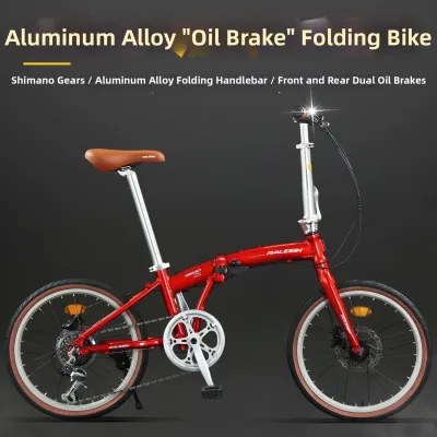 Raleigh | Ultra Light Portable Folding Bicycle Hydraulic Disc Brakes Shimano Gear