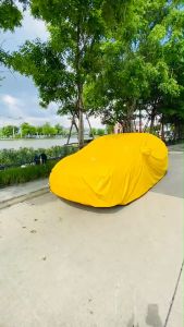 ผ้าคลุมรถยนต์ Toyota Altis สินค้าใหม่ ราคาถูก ผ้าHI PVCสีเหลือง หนา ไม่ติดสีรถ ฟรีถุงเก็บผ้า PVC