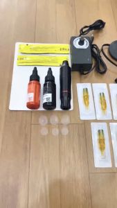 Bộ 1 máy pen xăm hay còn gọi là máy bút xăm hình kèm 7 mực xăm