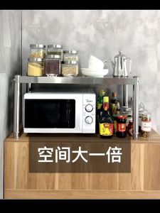Maximizing Kitchen Space: Stainless Steel Cabinets & Layered Shelves