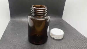 ขวด 150 มล. (50ใบ) พลาสติกสีชา กลม PVC + ฝาฉีก#37มม.