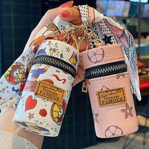 ที่ใส่กุญแจขนาดเล็กแบบพกพา ผู้หญิง กระเป๋าใส่เครื่องสําอางกระเป๋าใส่เหรียญ น่ารัก พวงกุญแจจี้ทรงกลมรูปทรงกระบอก ทันสมัย ดีไซน์