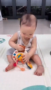 Đồ chơi gấu rút dây cho bé gặm nướu silicon kết hợp vận động tinh giáo dục sớm montessoriđồ chơi dây kéo cầm tay cho bé