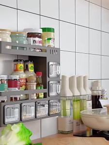 Non perforated kitchen seasoning storage rack multifunctional wall mounted household oil salt sauce vinegar storage rack