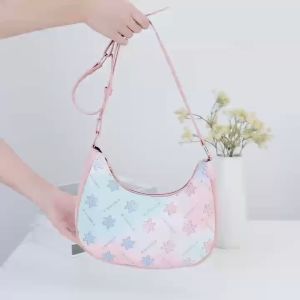 ABC BAGS# 8172 Trendy halfmoon-shape shoulder bag for Women features a pastel gradient design with a star pattern