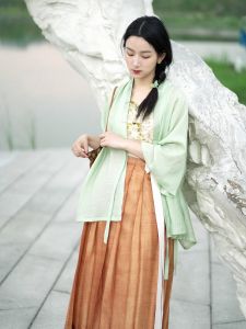 Lushu Collection Tang Suit with Silk Pleated Skirt And Fox Sleeve in Orange Green Color for Women Summer 2024 Daily Wear