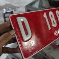 plat merah plat nomor mobil satuan atau setengah. 