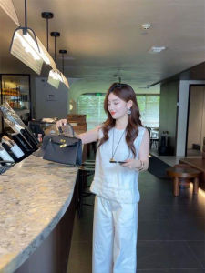 YUFUQING | เสื้อเชิ้ตแขนกุดคอตั้งสไตล์ฝรั่งเศสสีขาวสไตล์ย้อนยุคสำหรับผู้หญิงในช่วงฤดูร้อนปี 2025 เสื้อเชิ้ตผู้หญิงทรงหลวมสบาย ๆ สีพื้น